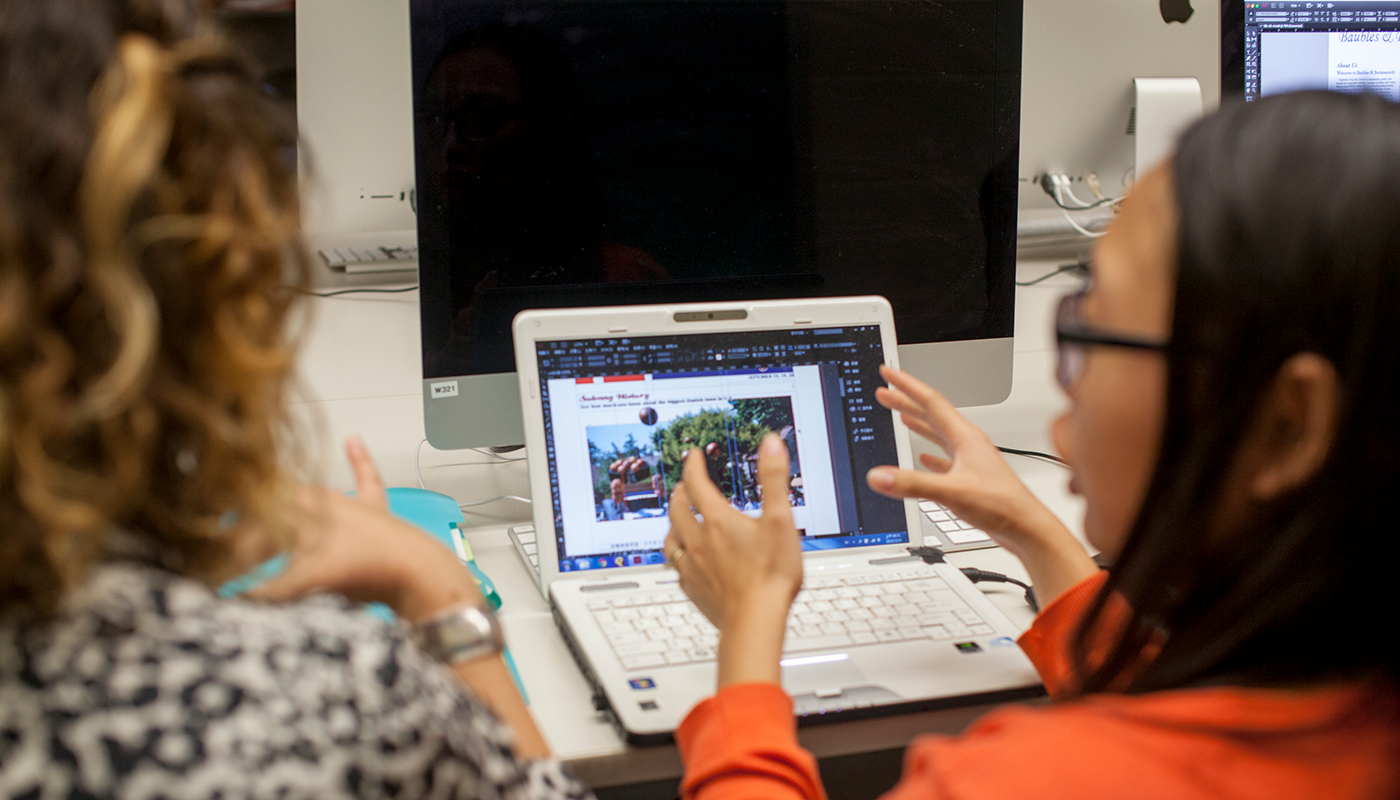 SBCC Graphic Design instructor teaching a group of students